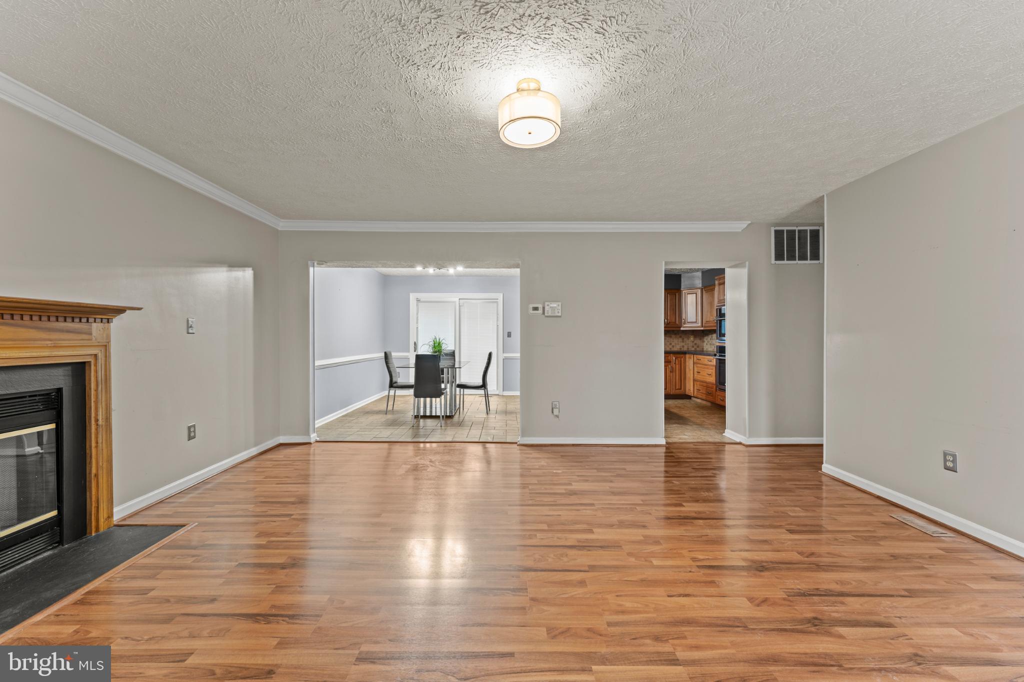 3189 Ebbtide Drive Edgewood, MD 21040 - Photo 4 of 33 Spacious living area with warm wood floors.