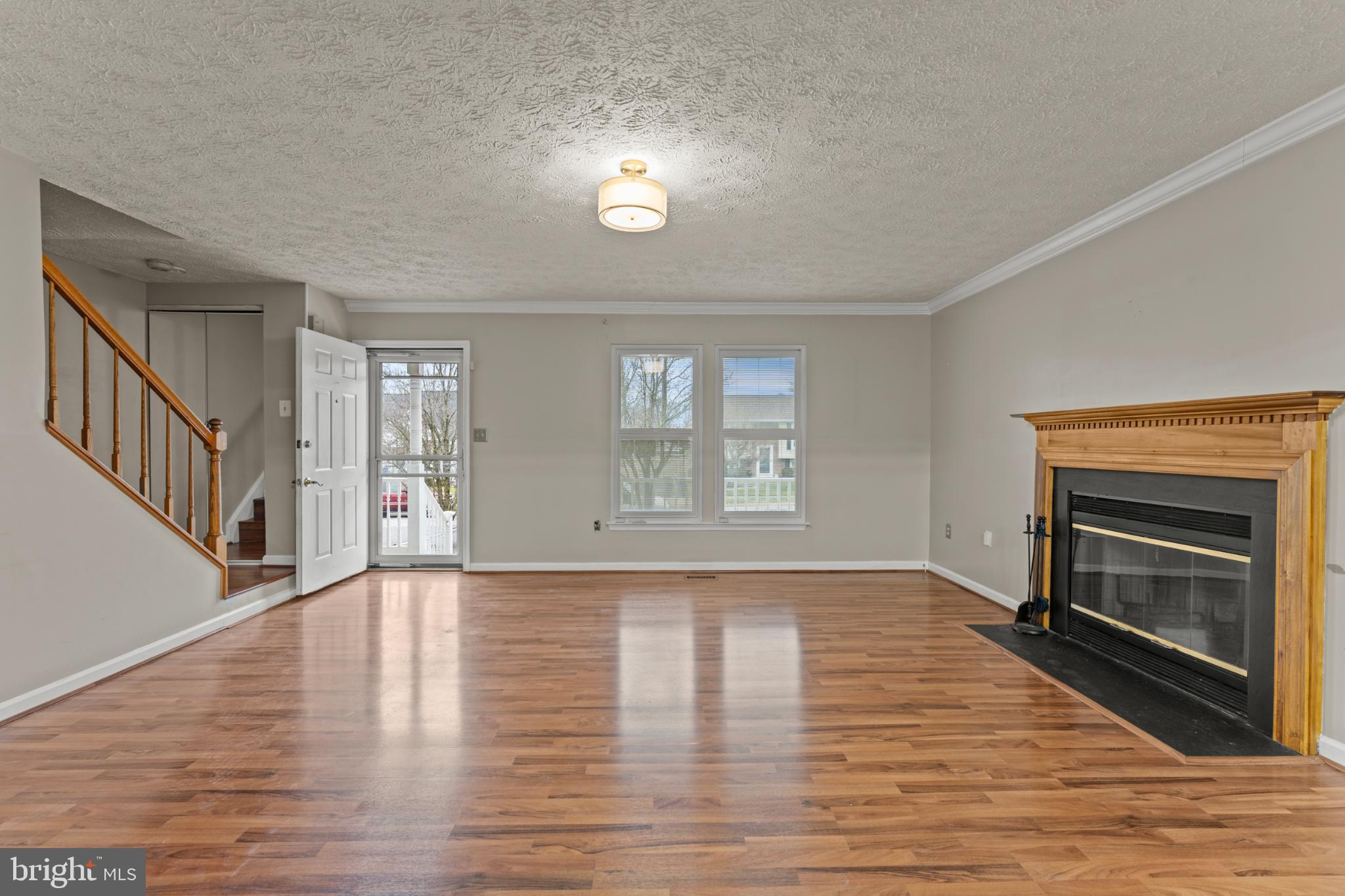 3189 Ebbtide Drive Edgewood, MD 21040 - Photo 5 of 33 Spacious living area with elegant fireplace.