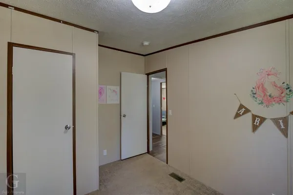 a view of a hallway with workspace