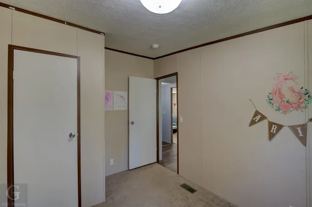 a view of a hallway with workspace