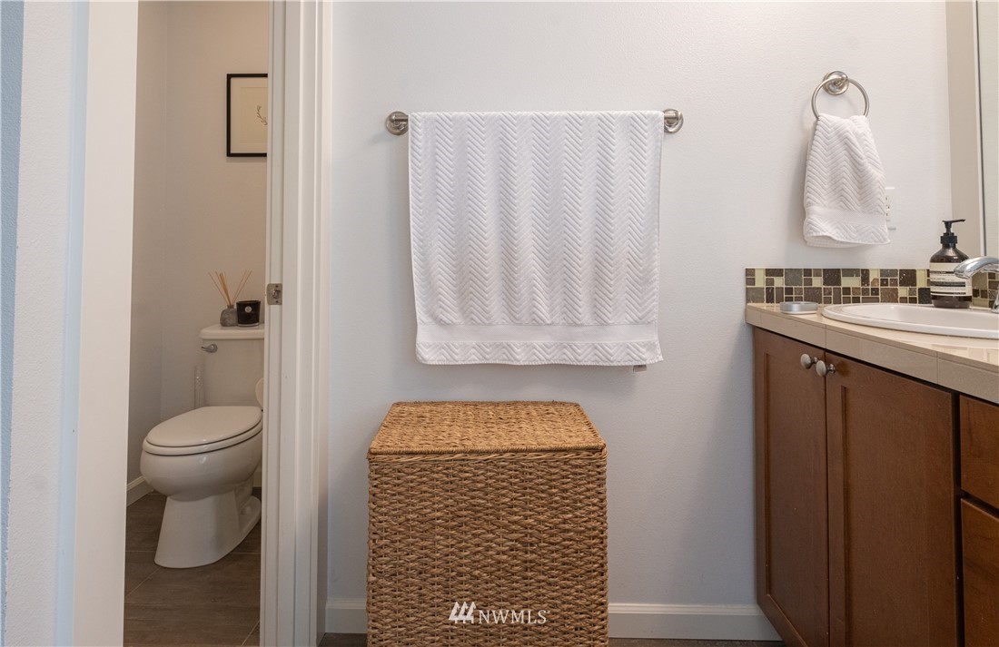 21807 38th Drive Southeast Bothell, WA 98021 - Photo 20 of 30 a bathroom with a toilet and a sink