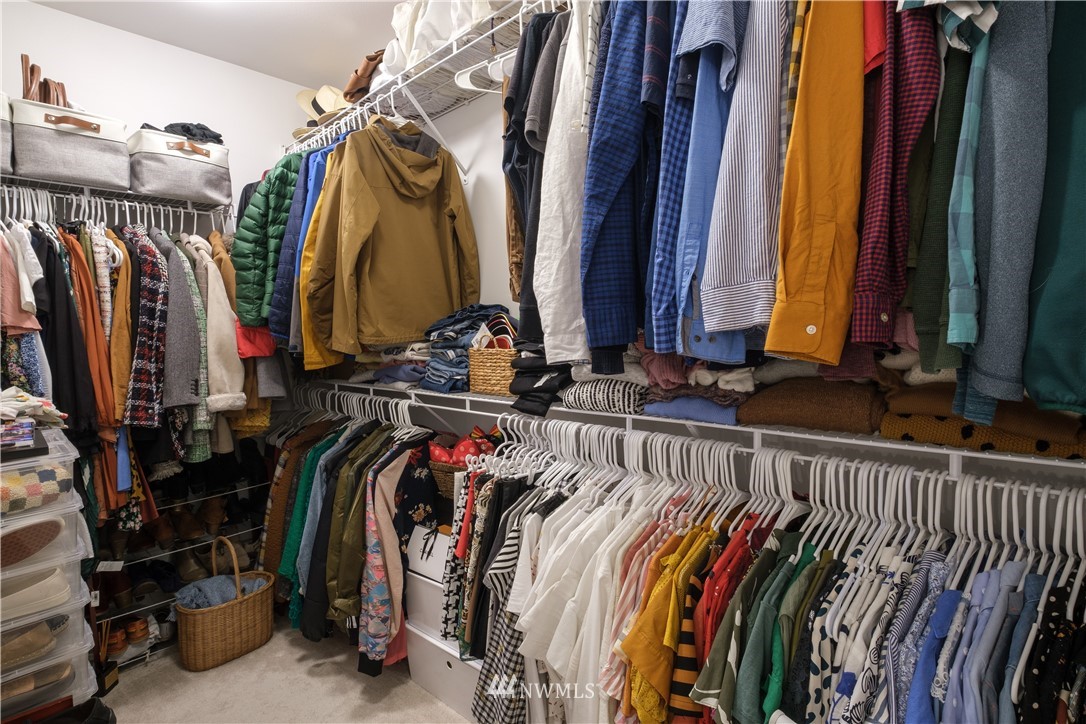 21807 38th Drive Southeast Bothell, WA 98021 - Photo 21 of 30 a view of walk in closet with clothes