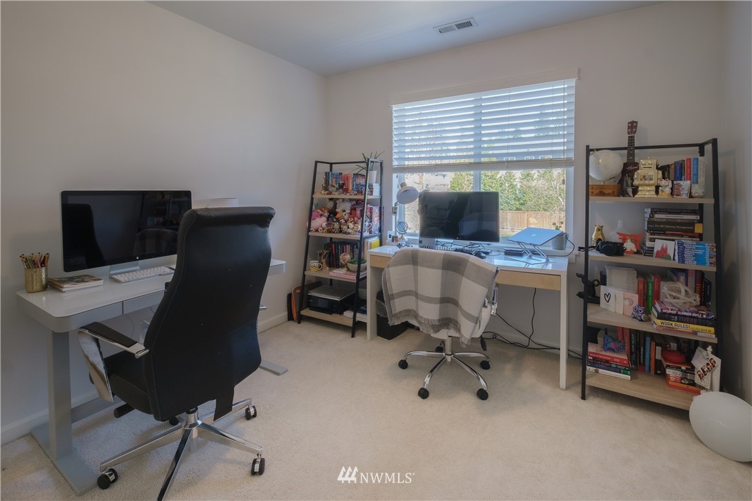 21807 38th Drive Southeast Bothell, WA 98021 - Photo 24 of 30 a view of a workspace with furniture and a window