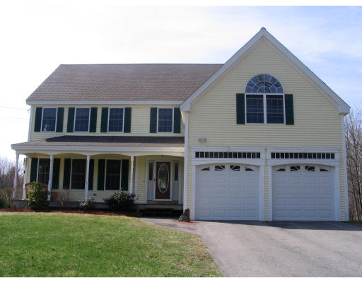 54 Groton Road Shirley, MA 01464 - Photo 1 of 18 a front view of a house with garden