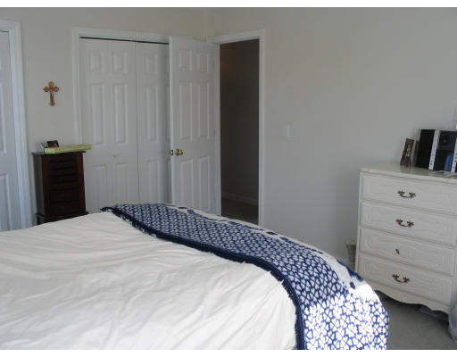 54 Groton Road Shirley, MA 01464 - Photo 12 of 18 a bedroom with a bed and a closet