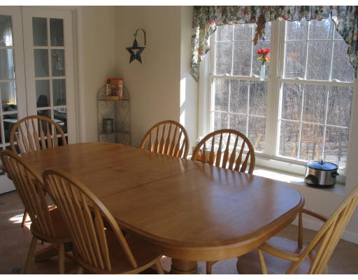 54 Groton Road Shirley, MA 01464 - Photo 5 of 18 a view of a dining room with furniture