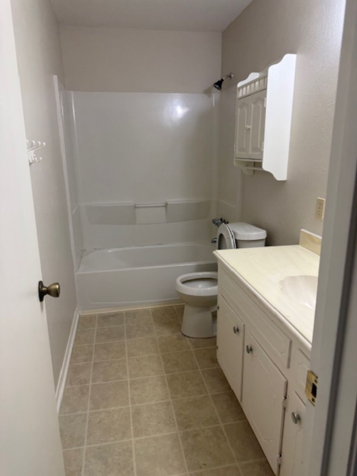 19103 Shay Lane Humble, TX 77346 - Photo 14 of 18 a bathroom with a bathtub sink and toilet