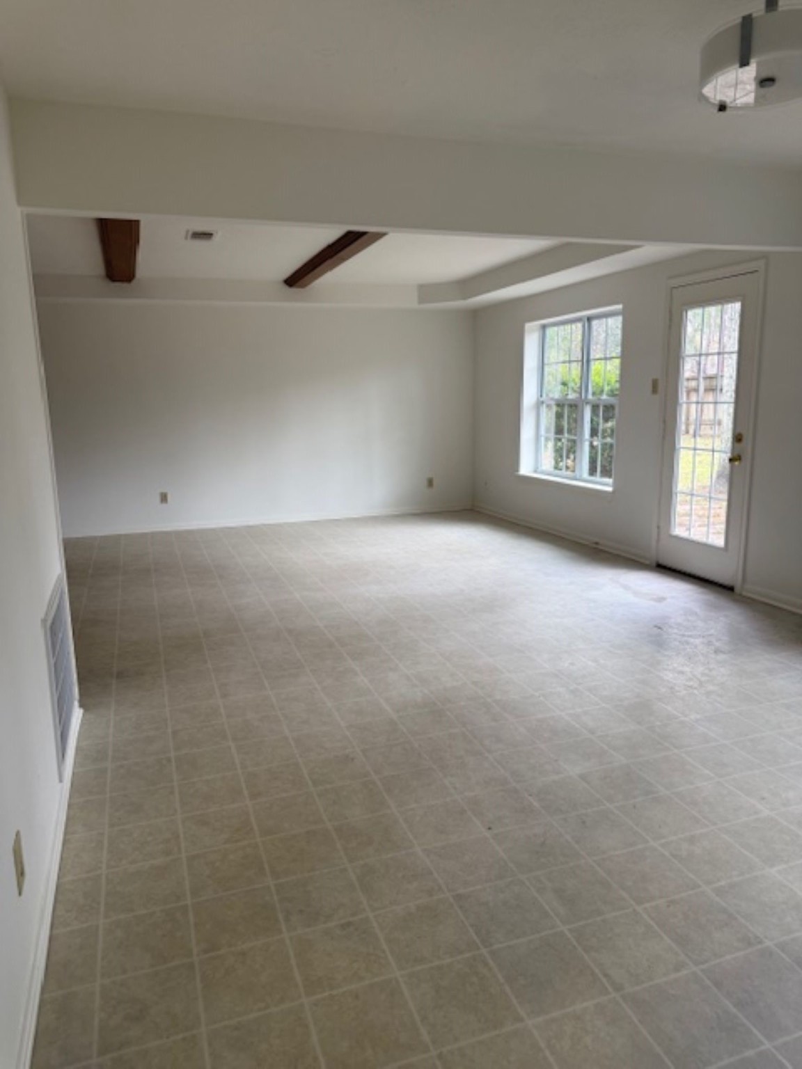 19103 Shay Lane Humble, TX 77346 - Photo 8 of 18 a view of a livingroom with an empty space and a window