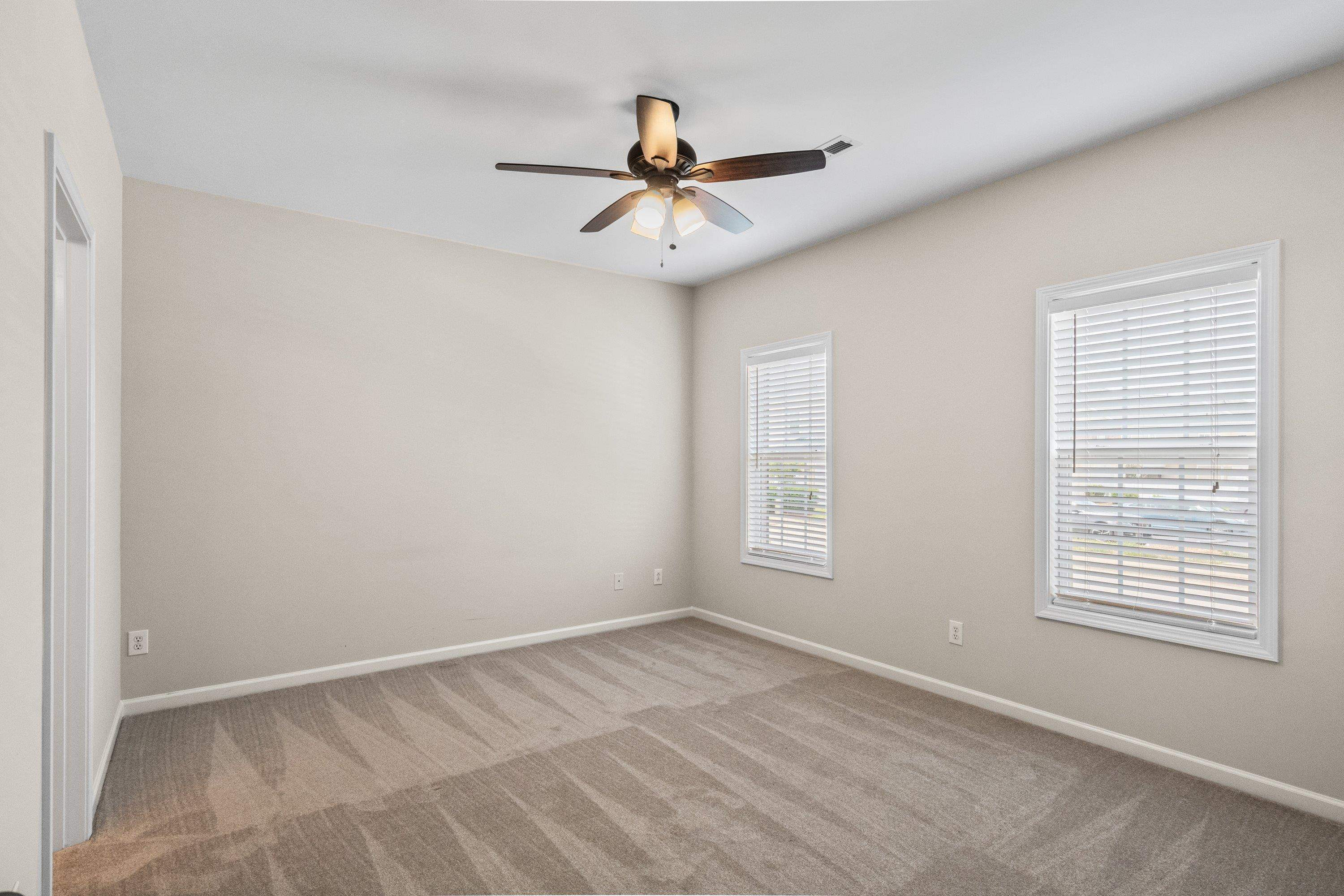 1369 Still Monument Way Raleigh, NC 27603 - Photo 17 of 46 a view of an empty room with a window