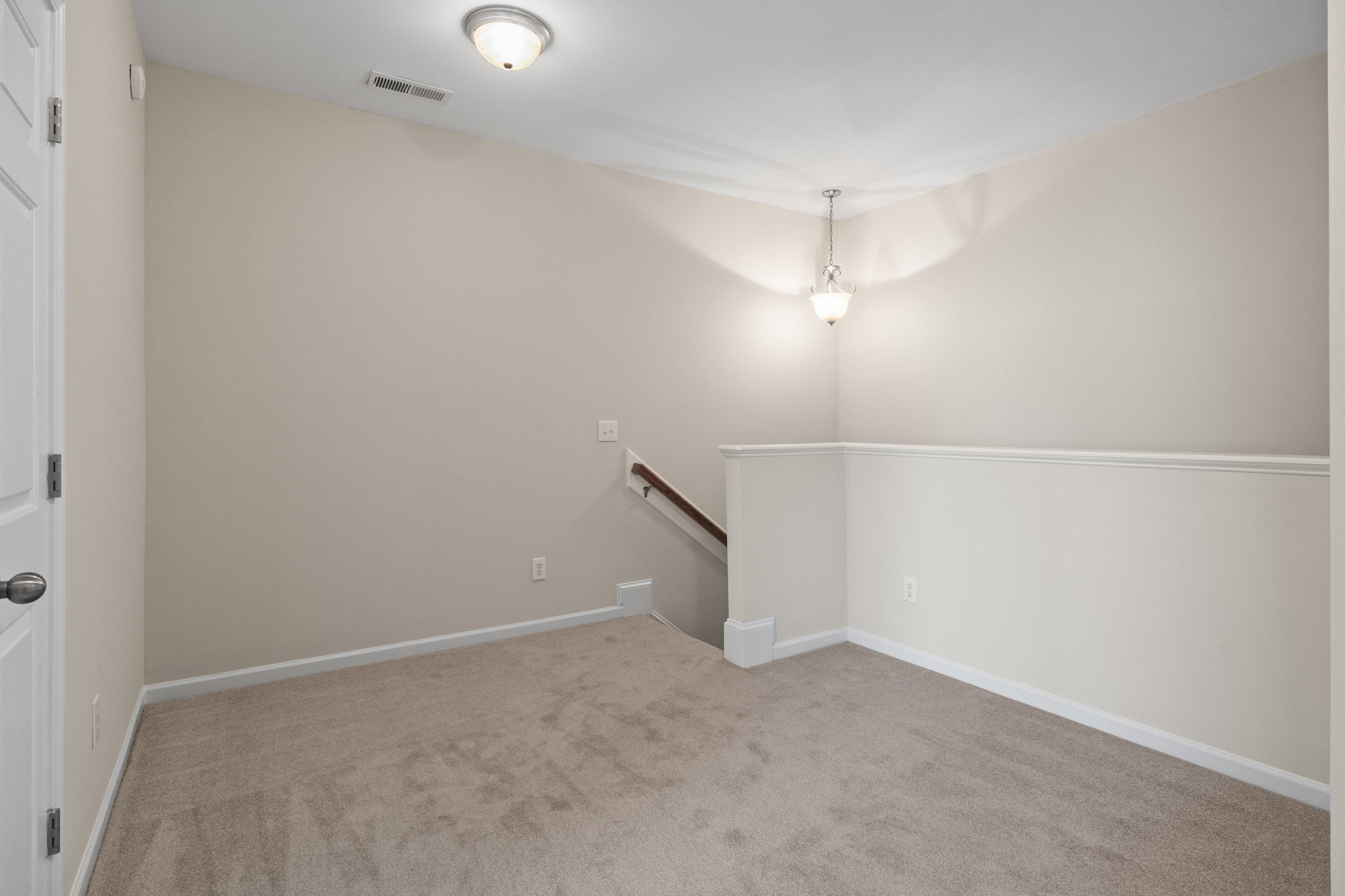 1369 Still Monument Way Raleigh, NC 27603 - Photo 23 of 46 a view of a room with an empty space
