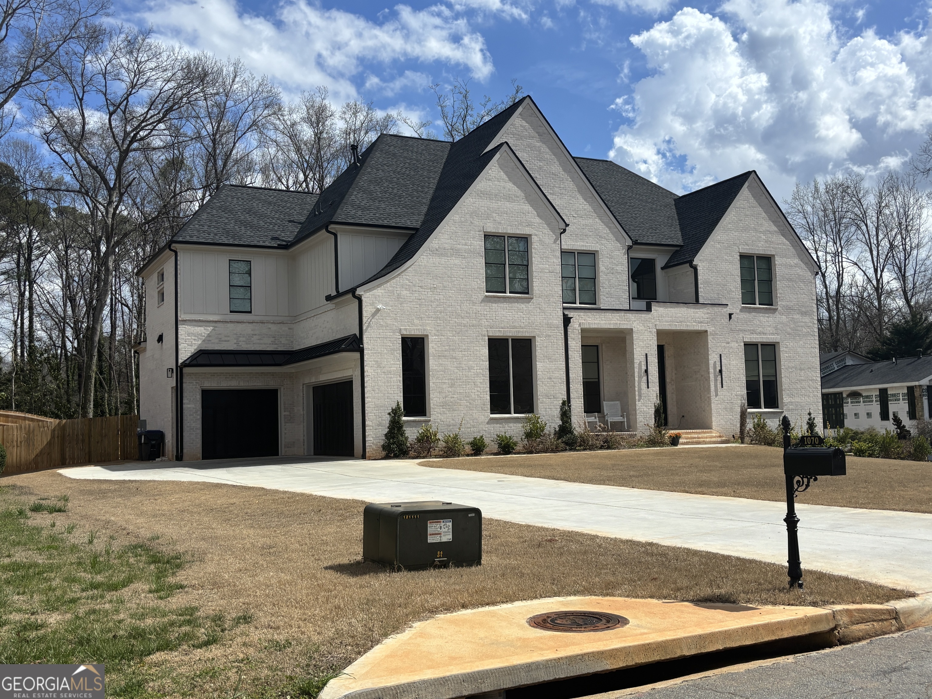 0 Hamby Road Acworth, GA 30102 - Photo 5 of 8 a view of a white house with large trees