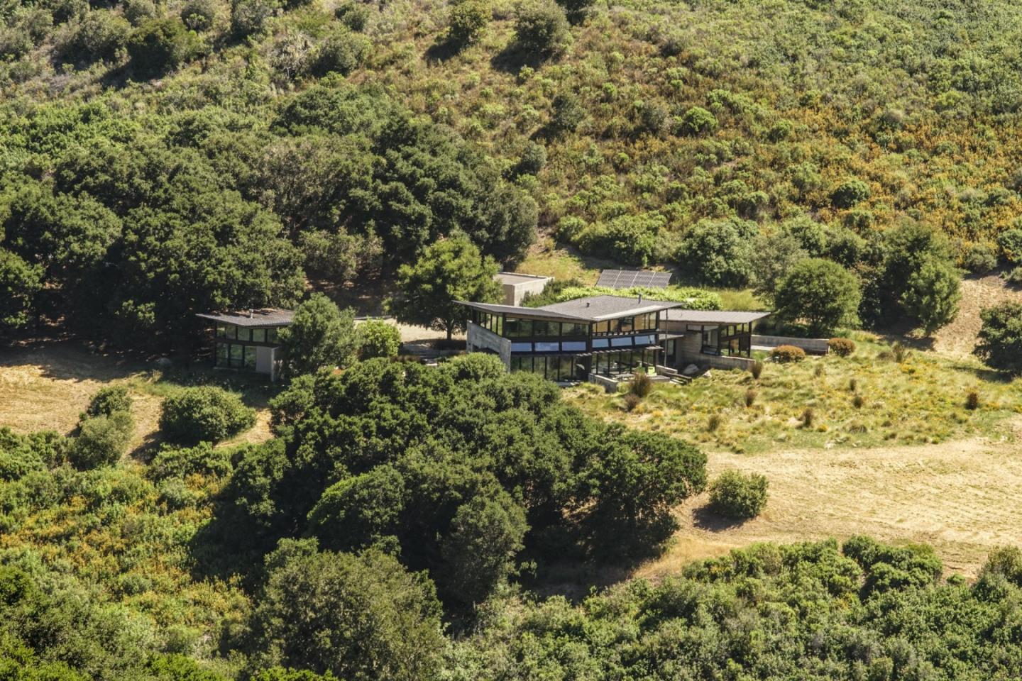 1 Goodrich Trail Carmel, CA 93923 - Photo 3 of 50 a view of a garden with a fountain