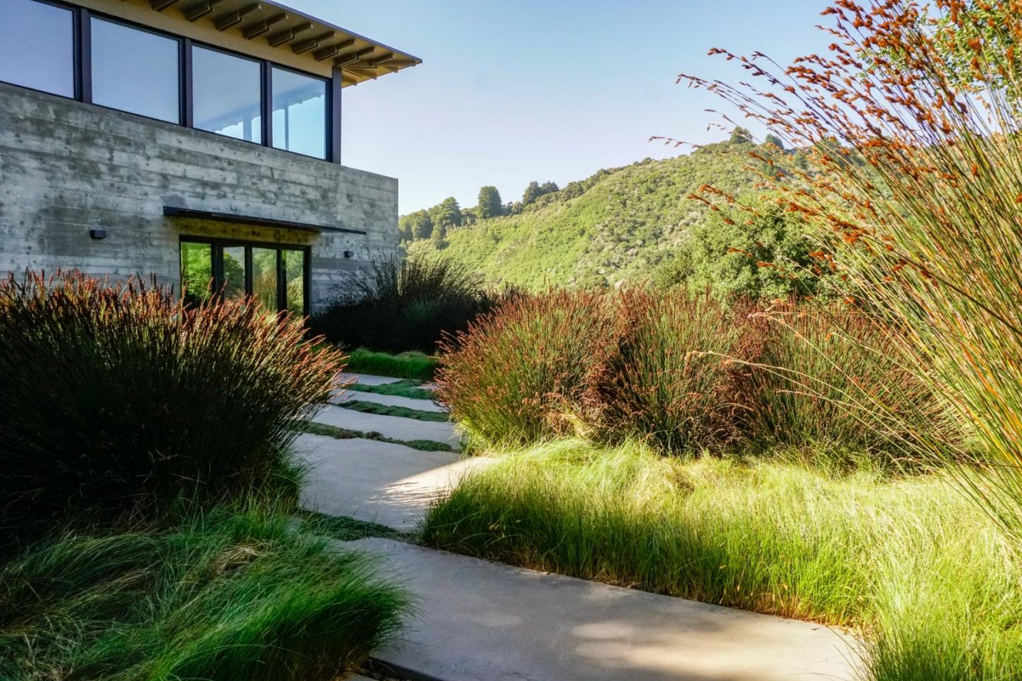 1 Goodrich Trail Carmel, CA 93923 - Photo 33 of 50 a front view of a house with a yard