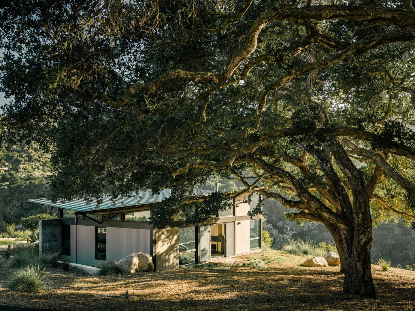 1 Goodrich Trail Carmel, CA 93923 - Photo 41 of 50 a view of house with trees in the background