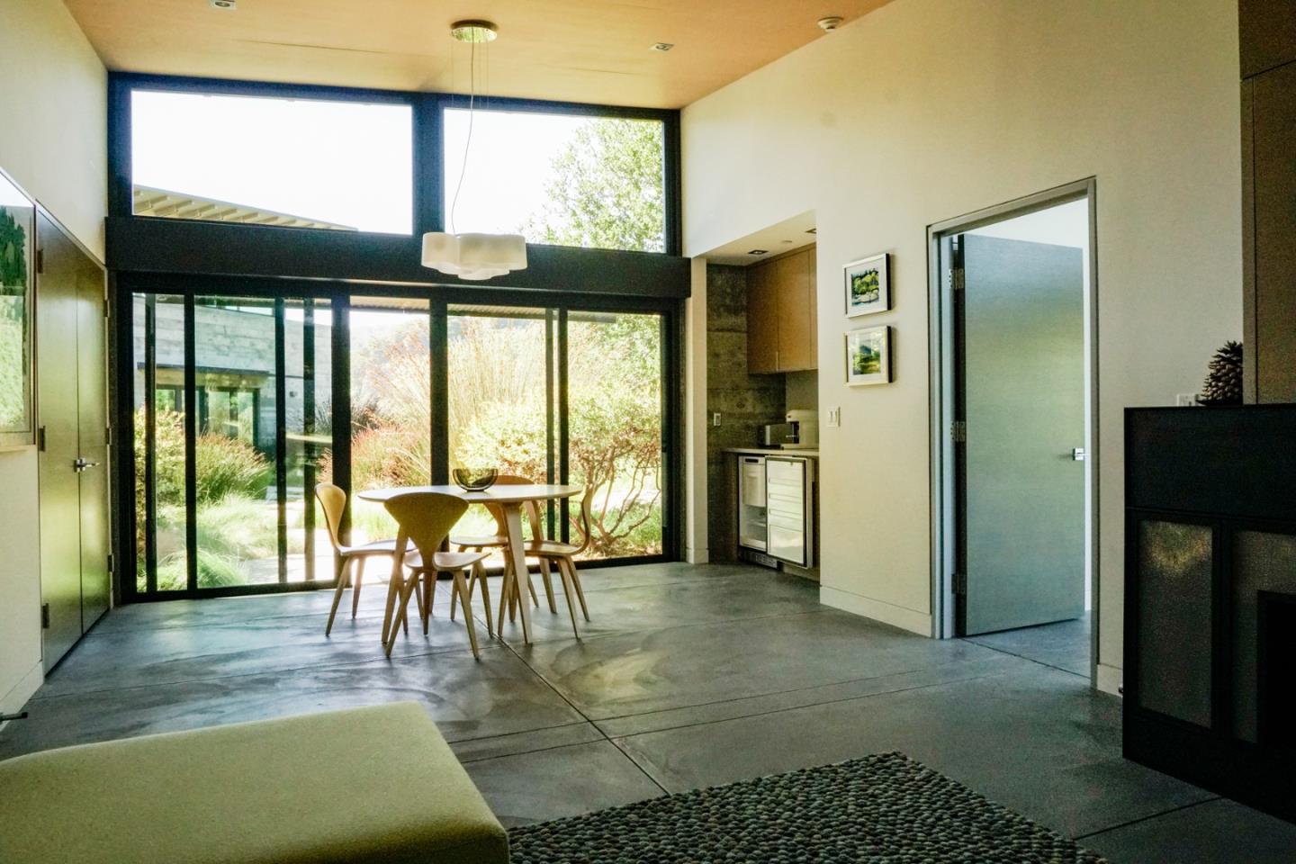 1 Goodrich Trail Carmel, CA 93923 - Photo 45 of 50 a dining room with furniture and large windows