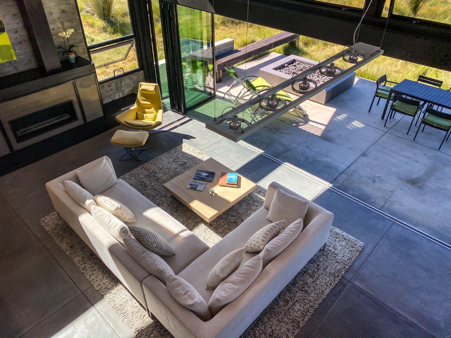 1 Goodrich Trail Carmel, CA 93923 - Photo 8 of 50 a living room with furniture and a floor to ceiling window