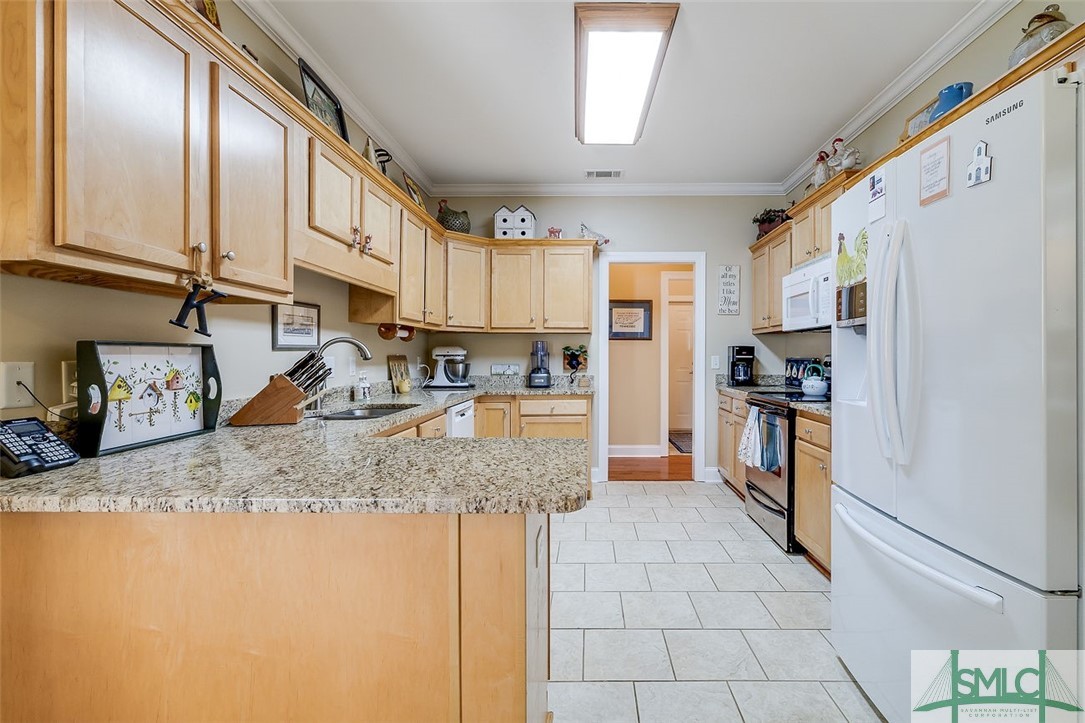 150 Cambridge Drive Rincon, GA 31326 - Photo 15 of 44 Kitchen
