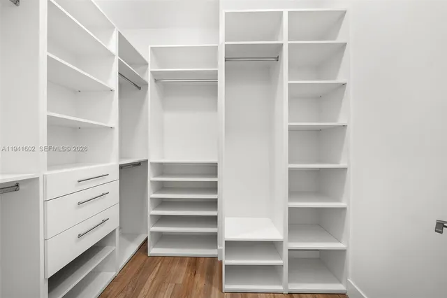 a view of an empty walk in closet