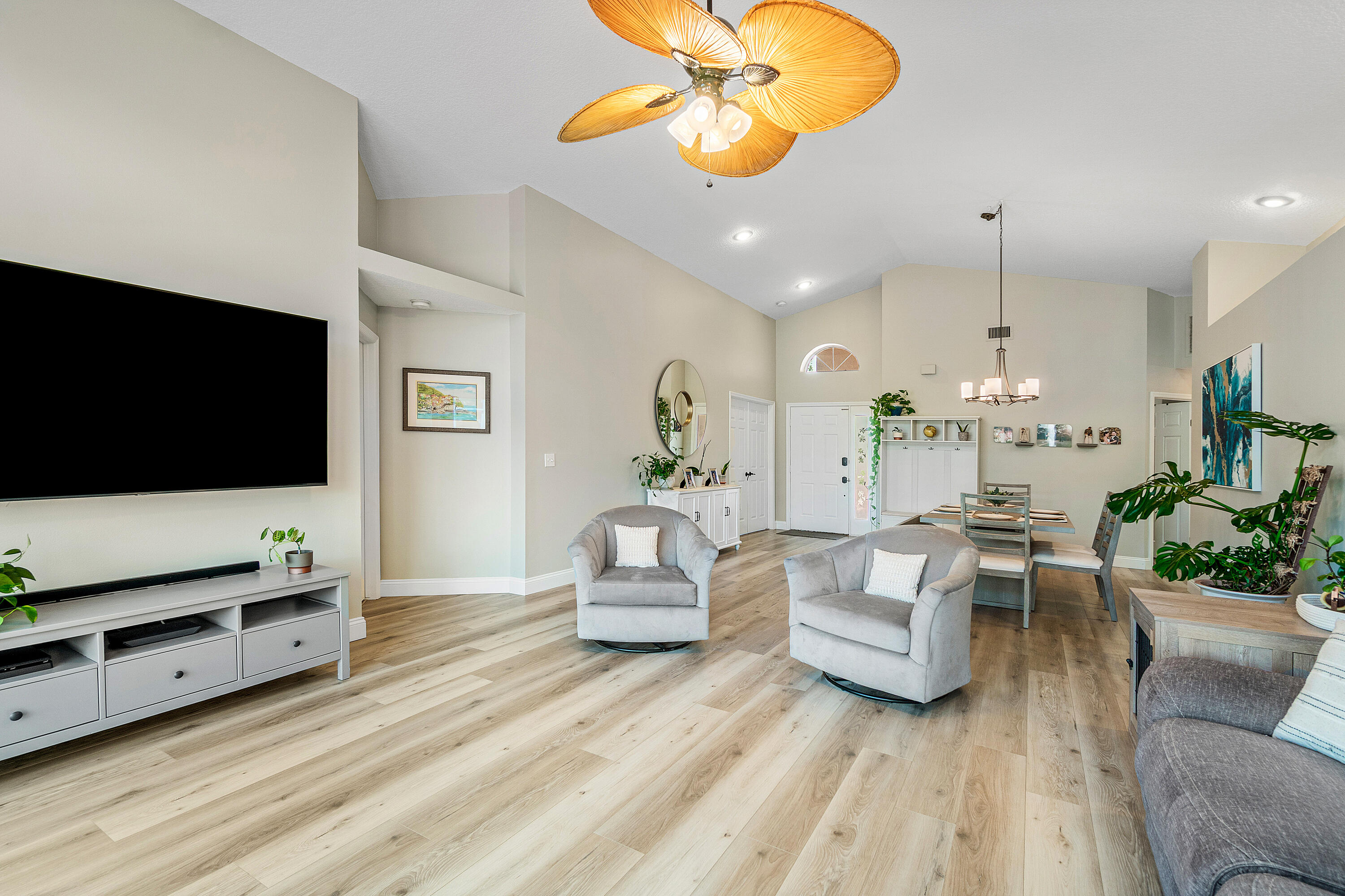 10560 Plainview Circle Boca Raton, FL 33498 - Photo 12 of 45 a living room with furniture and a flat screen tv