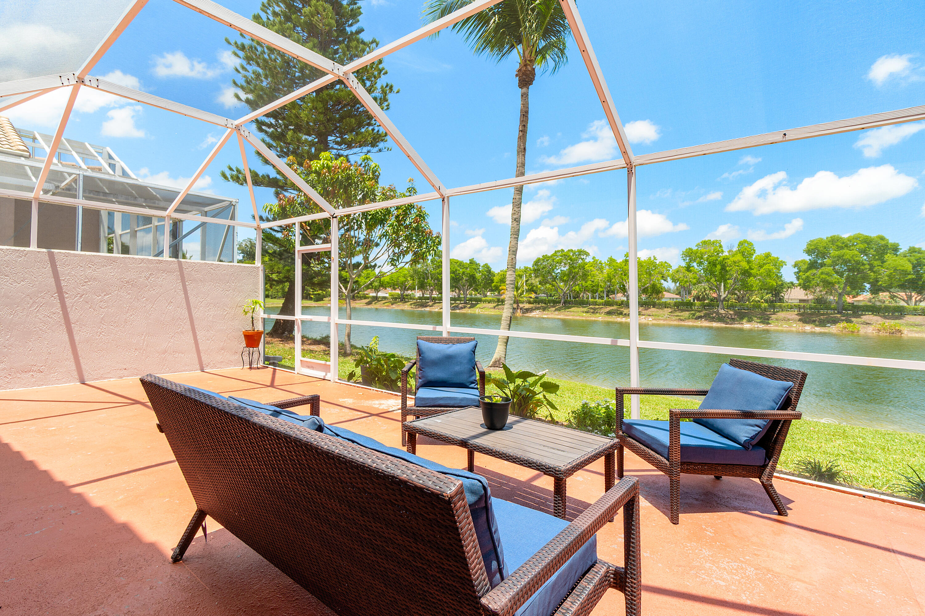 10560 Plainview Circle Boca Raton, FL 33498 - Photo 22 of 45 a sitting area with furniture and table in balcony