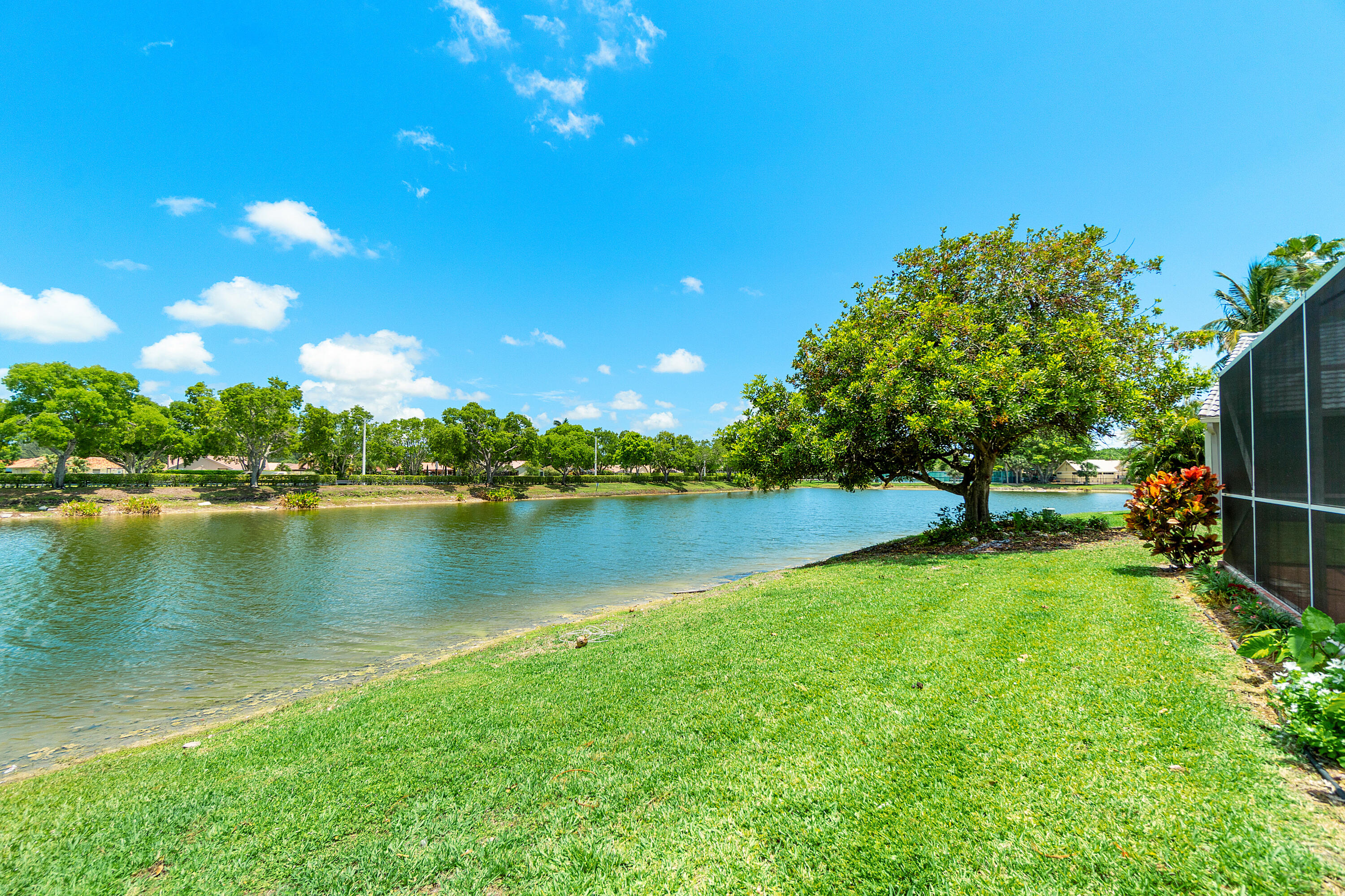 10560 Plainview Circle Boca Raton, FL 33498 - Photo 27 of 45 a view of a lake with houses