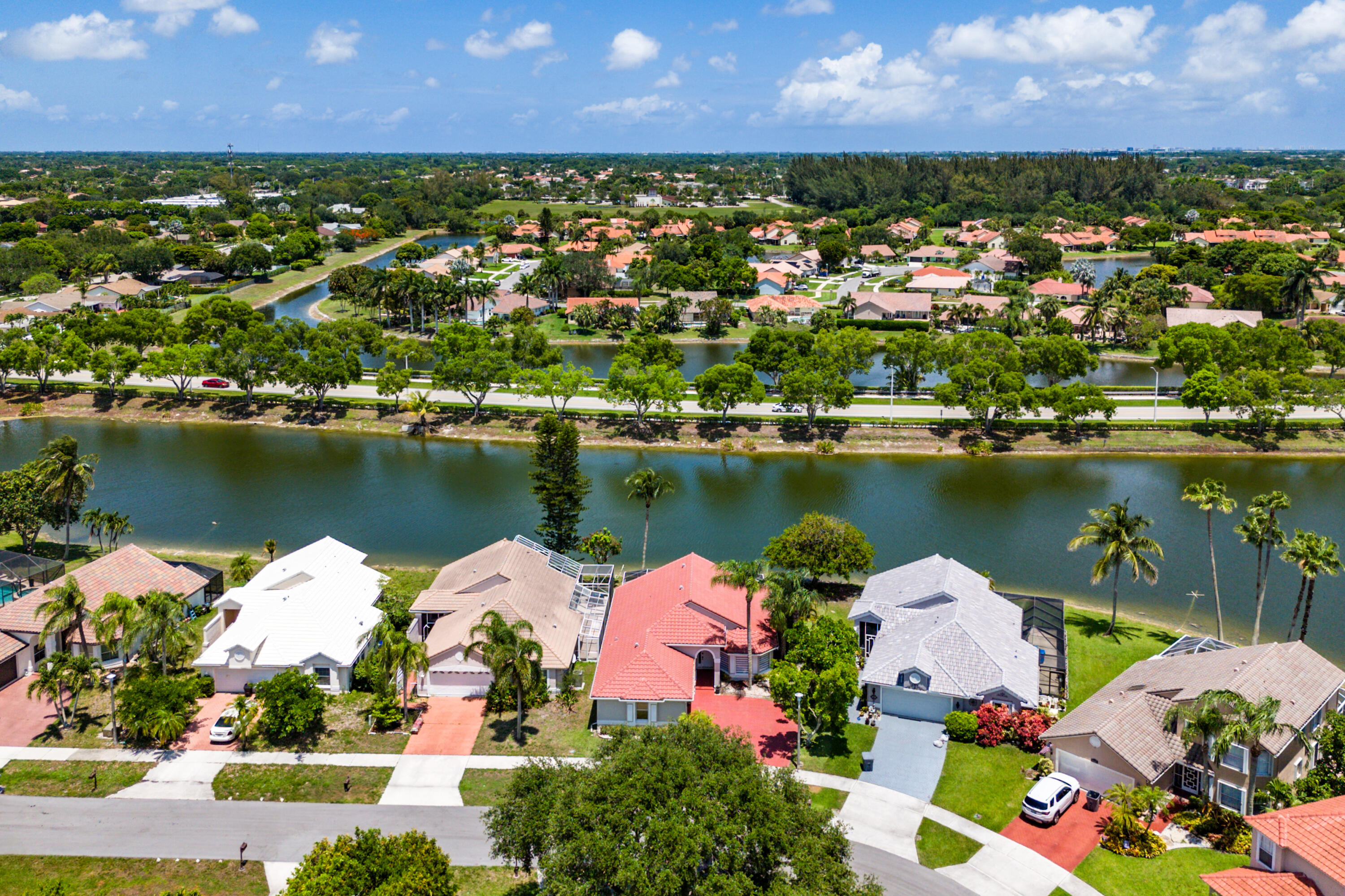 10560 Plainview Circle Boca Raton, FL 33498 - Photo 30 of 45 an aerial view of a houses with a lake view