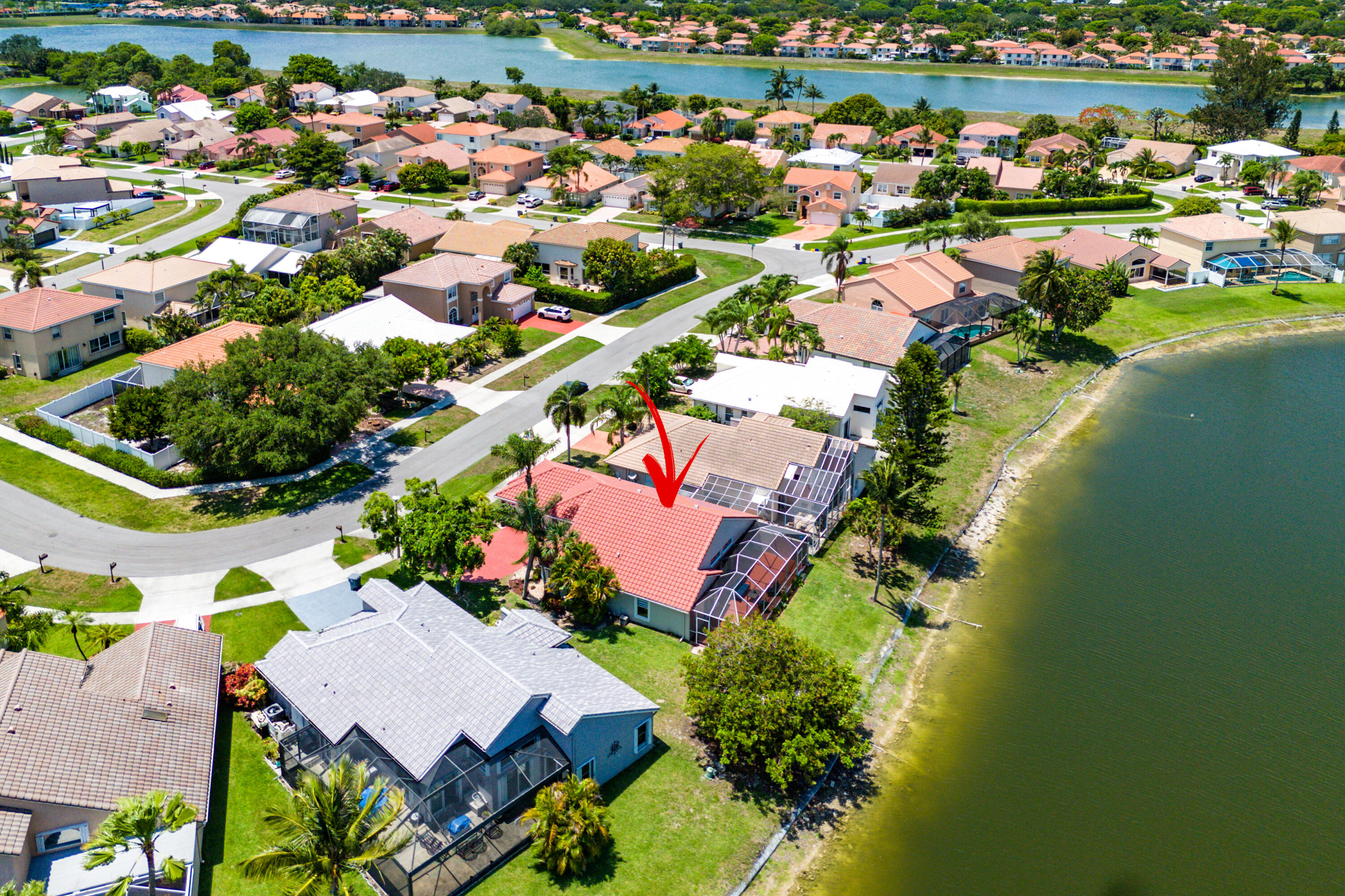 10560 Plainview Circle Boca Raton, FL 33498 - Photo 34 of 45 an aerial view of residential houses with outdoor space and swimming pool