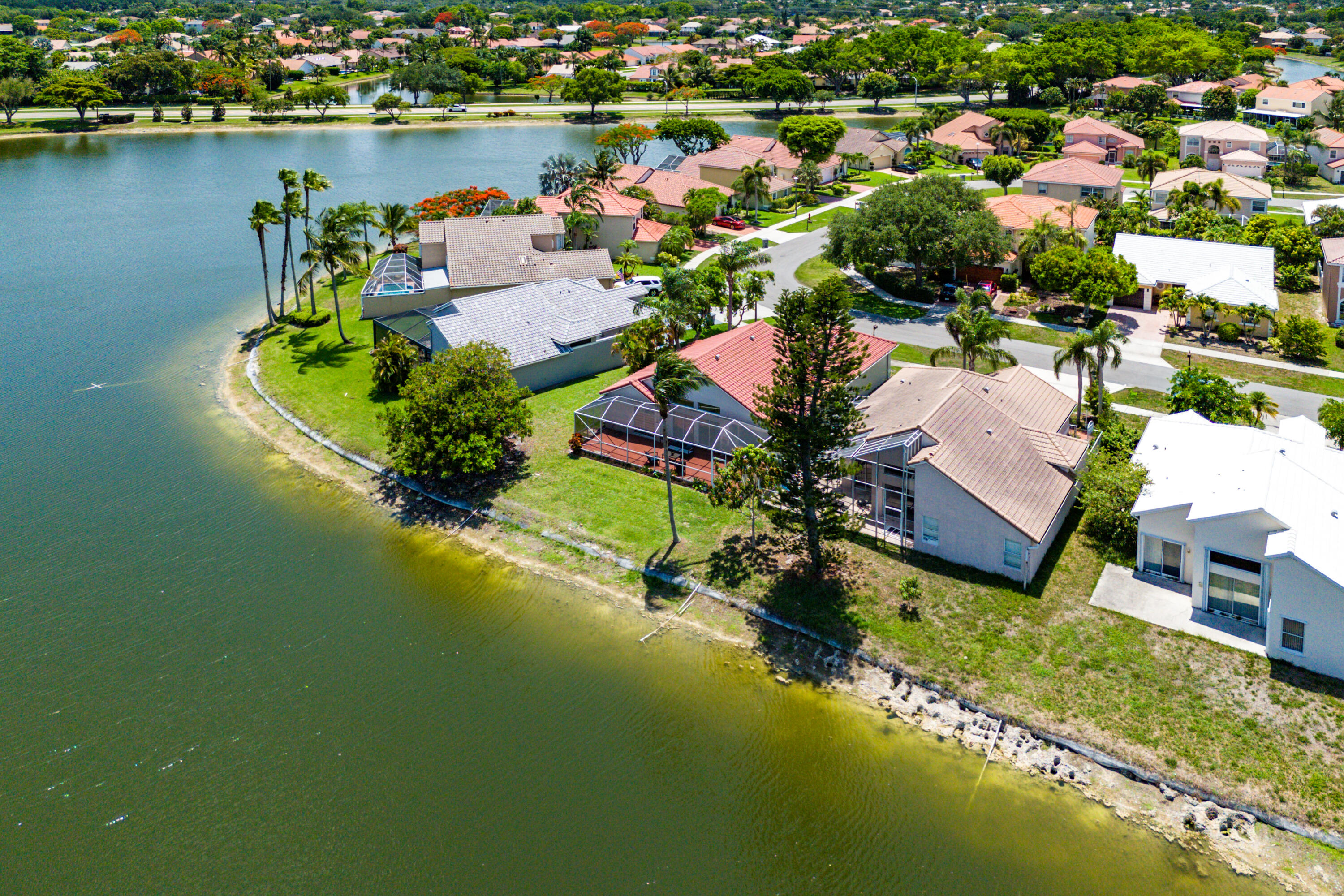 10560 Plainview Circle Boca Raton, FL 33498 - Photo 35 of 45 an aerial view of a house with a lake view