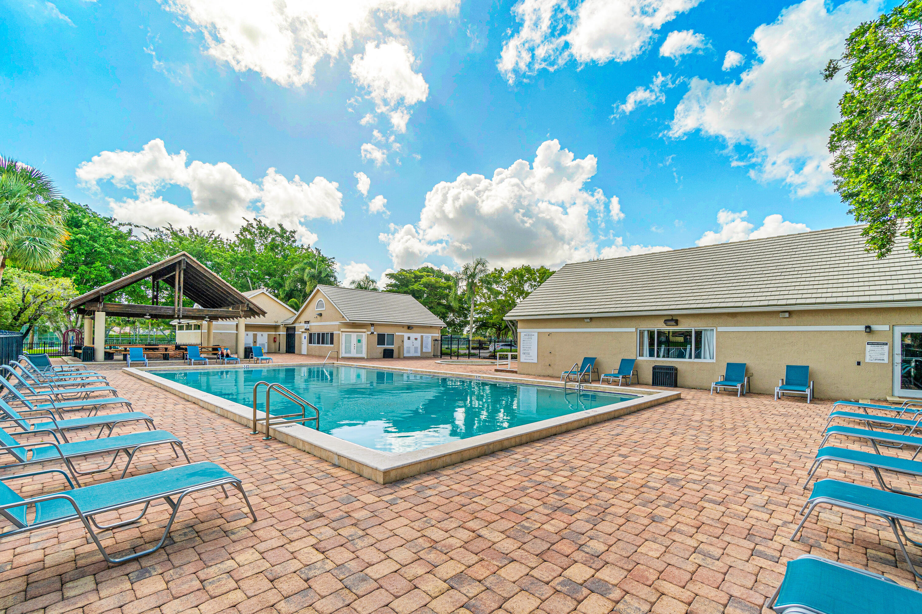 10560 Plainview Circle Boca Raton, FL 33498 - Photo 42 of 45 a front view of a house with garden