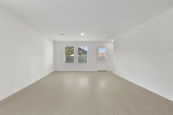 an empty room with windows