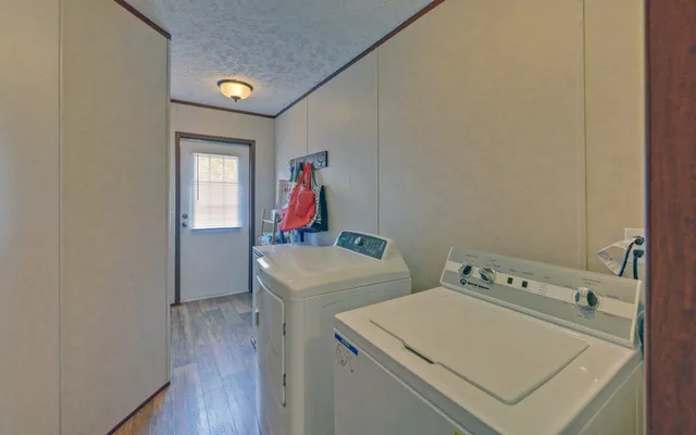 a view of a backyard with a table and a slide
