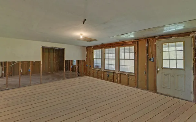 a view of entryway with wooden floor