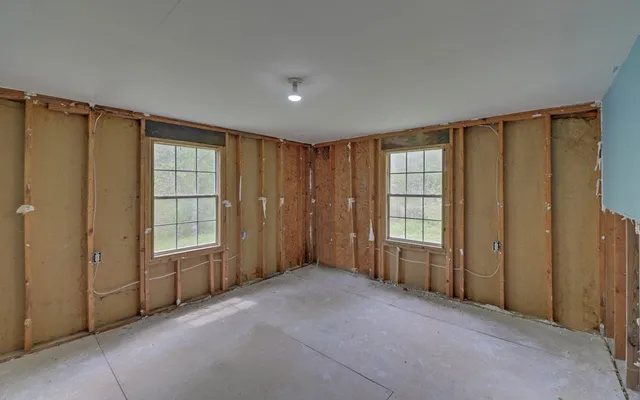 a bathroom with a shower and a tub