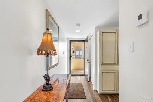 a view of livingroom with furniture and floor to ceiling window
