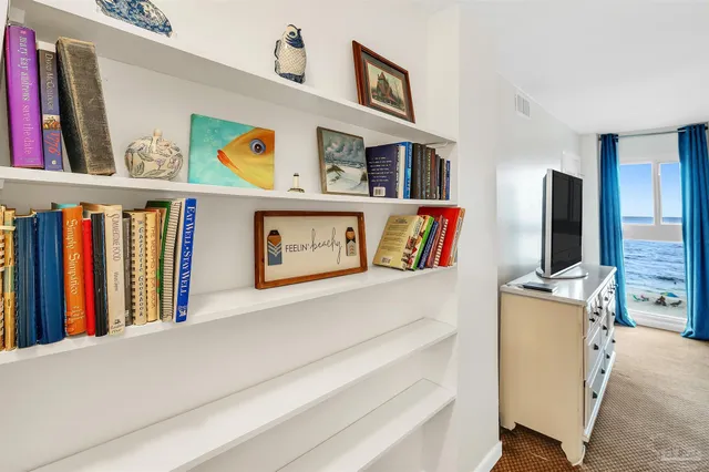 a view of a refrigerator in a kitchen