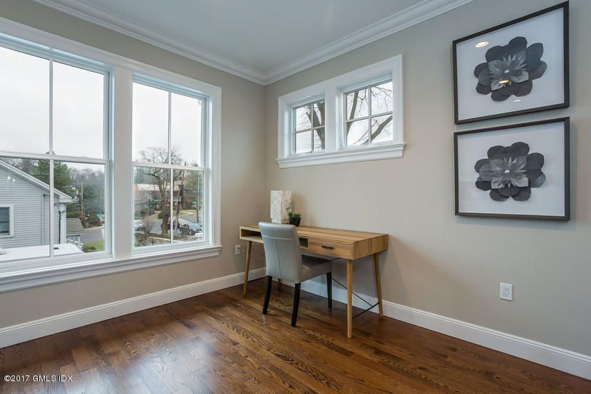 52 Brookside Drive, Unit D Greenwich, CT 06830 - Photo 13 of 24 a work room with a wooden floor and a window