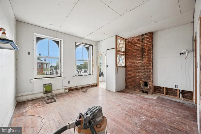 a view of front door and bedroom