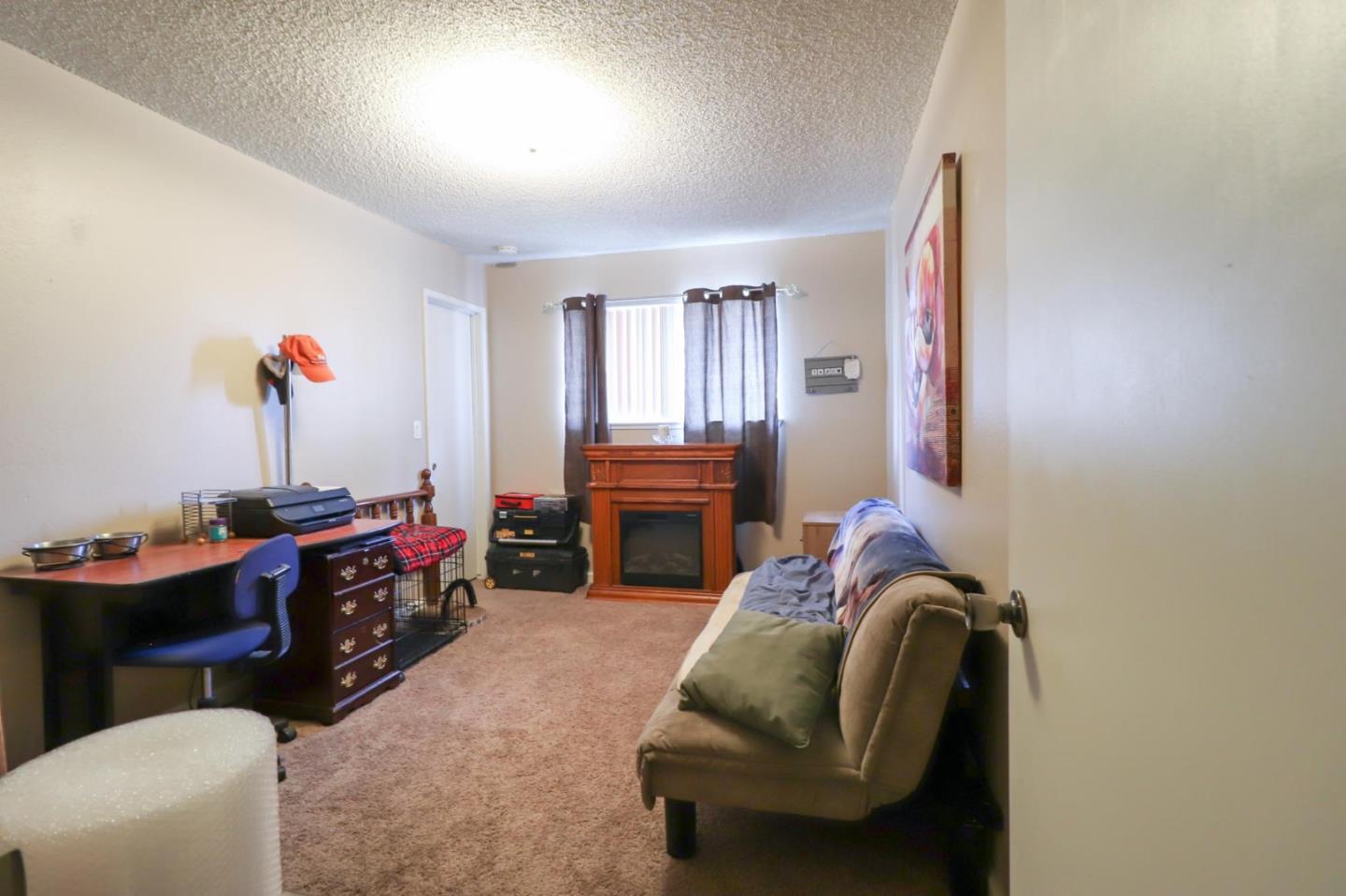 1725 East Rumble Road Modesto, CA 95355 - Photo 20 of 31 a bedroom with bed and a window
