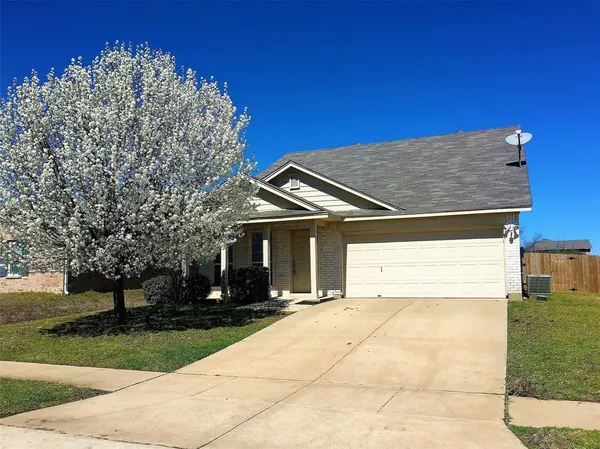 a front view of house with yard