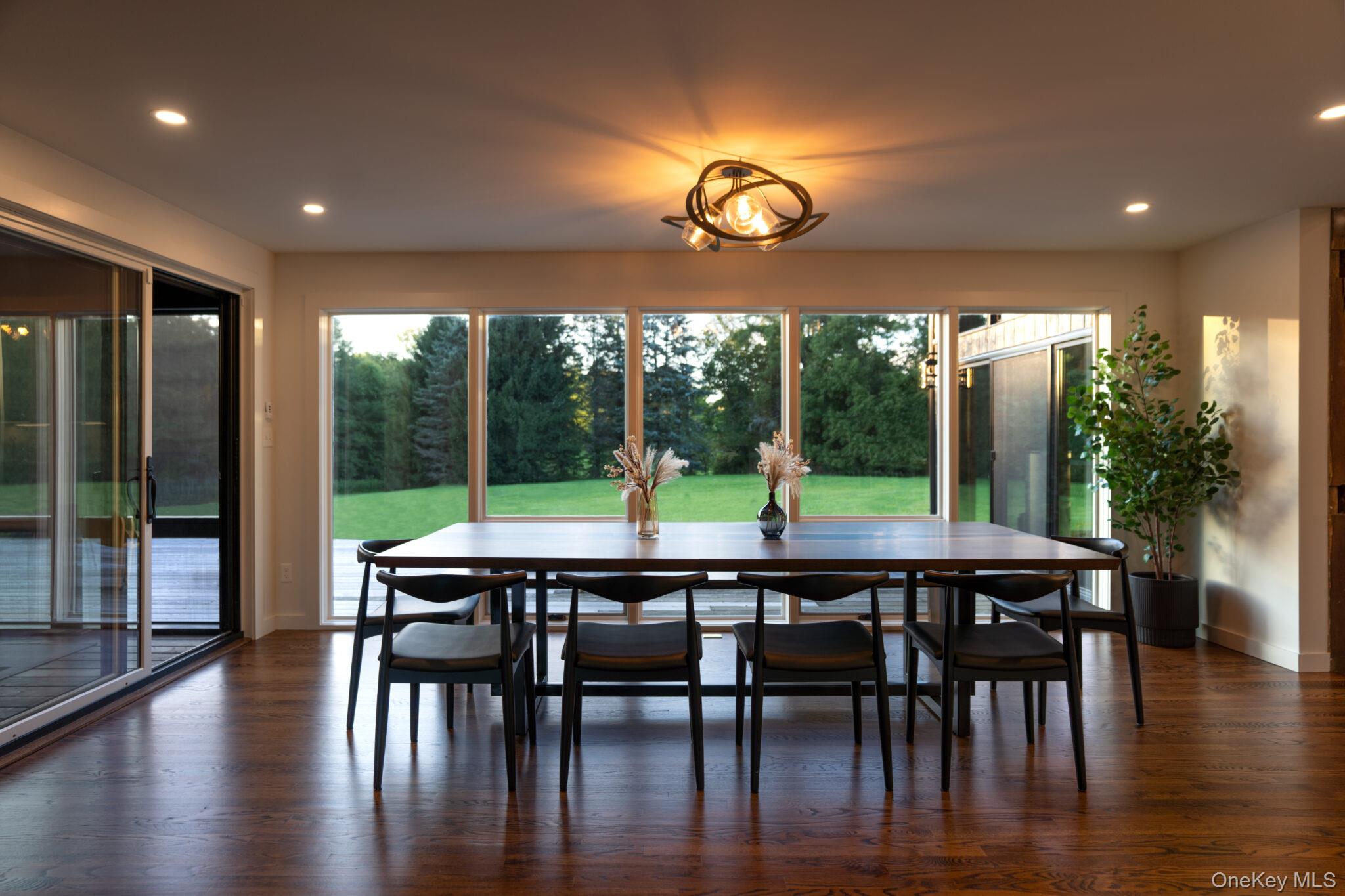 107 Cold Spring Road Stanfordville, NY 12581 - Photo 13 of 36 a dining room with furniture window and wooden floor