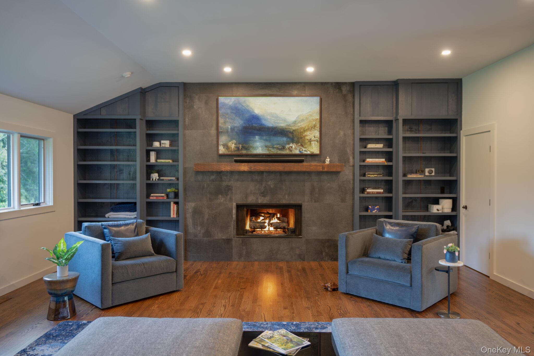 107 Cold Spring Road Stanfordville, NY 12581 - Photo 14 of 36 a living room with furniture and a fireplace