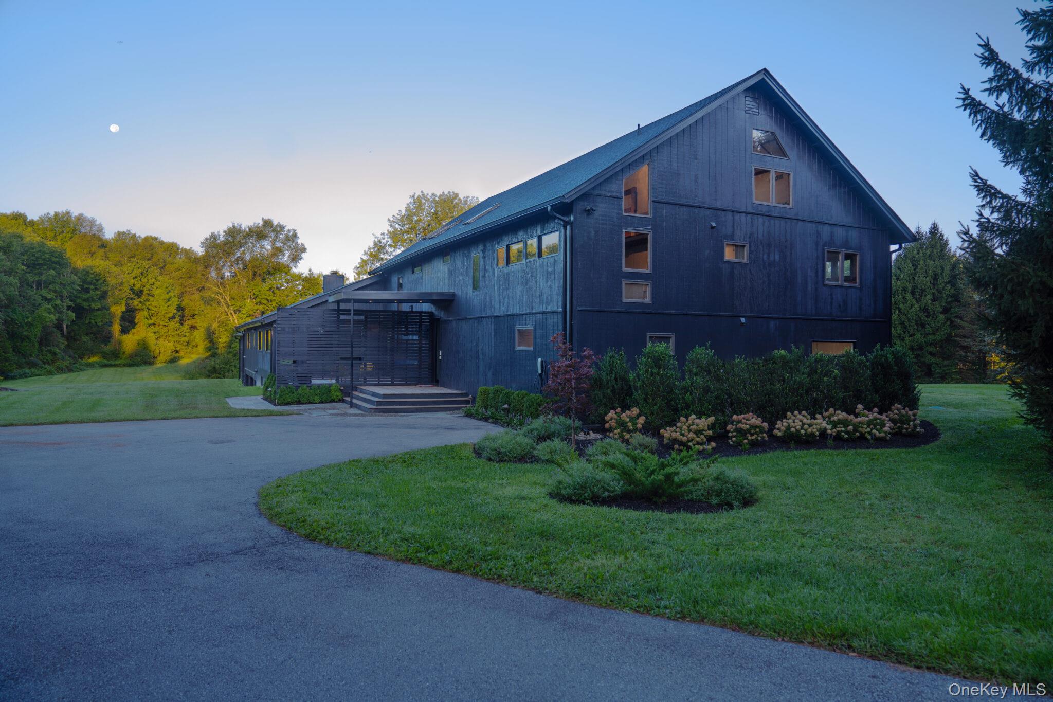 107 Cold Spring Road Stanfordville, NY 12581 - Photo 2 of 36 a front view of a house with garden