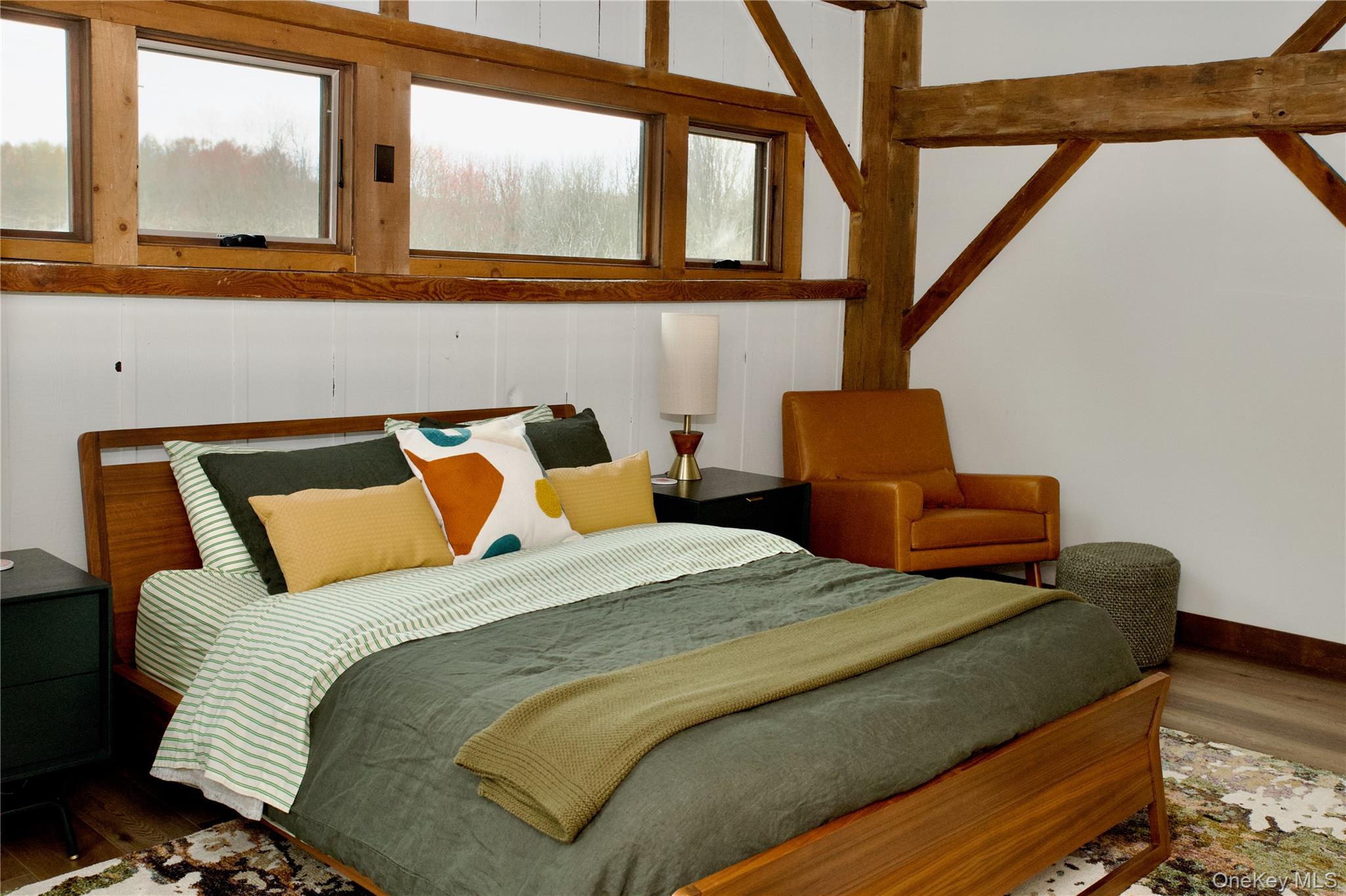 107 Cold Spring Road Stanfordville, NY 12581 - Photo 22 of 36 a bed sitting in a bedroom next to a window
