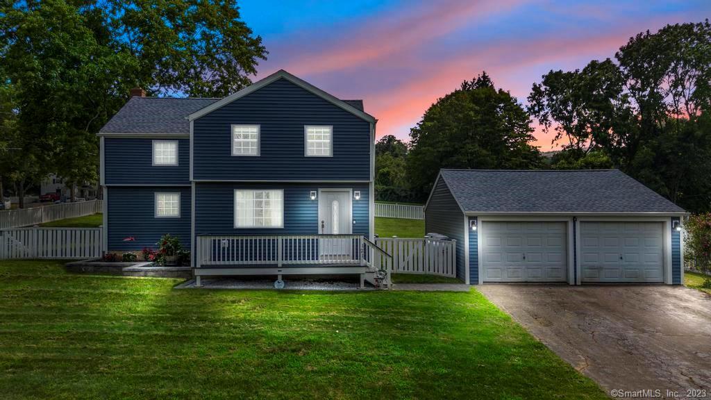121 Coe Road Durham, CT 06422 - Photo 1 of 1 a front view of a house with a yard