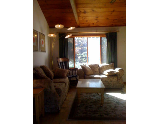 1 Scribner Road Tyngsborough, MA 01879 - Photo 4 of 13 a living room with furniture and a large window