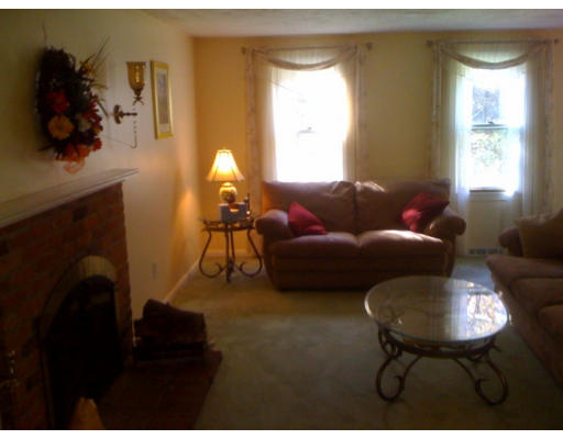 1 Scribner Road Tyngsborough, MA 01879 - Photo 8 of 13 a living room with furniture and a window