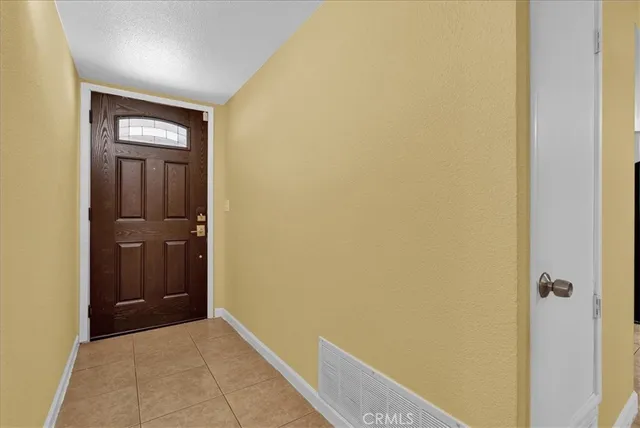 a view of a hallway with closet