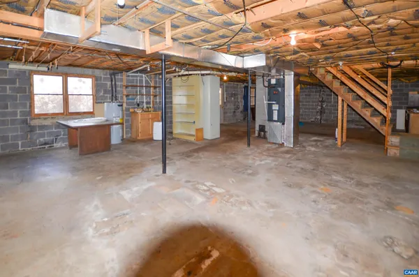 a view of a room with wooden walls