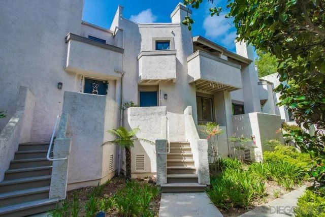 front view of a house with a street