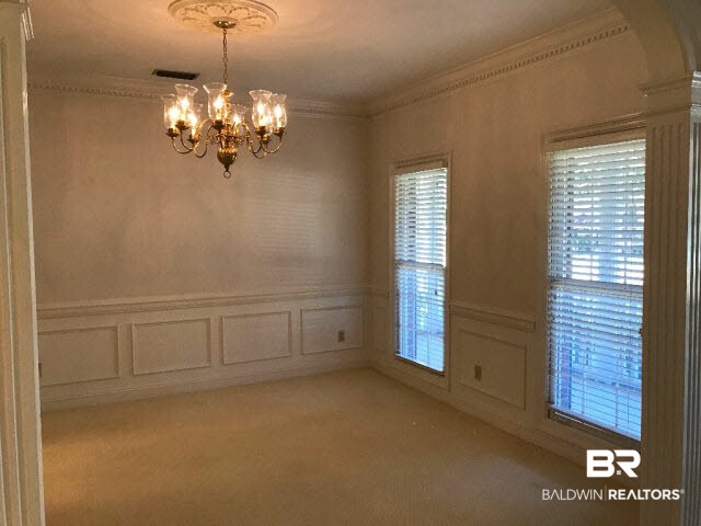 401 Potters Mills Road Daphne, AL 36526 - Photo 8 of 28 For Sale: 401 Potters Mill Avenue, Daphne, AL 36526 Dining Room with beautiful trim work